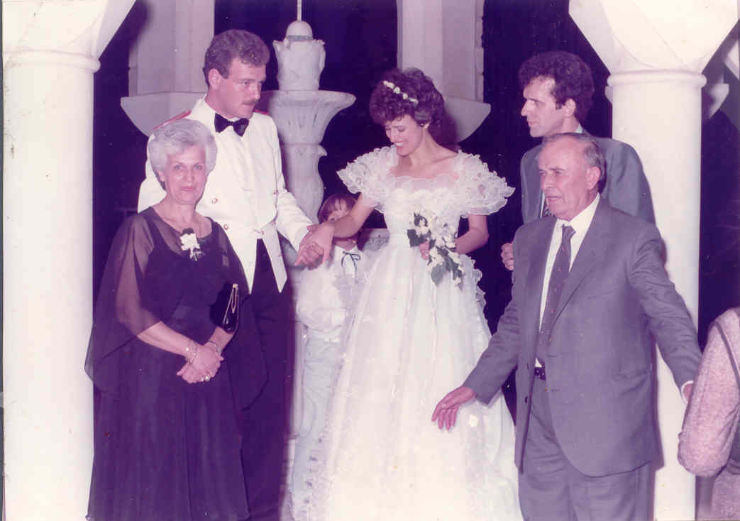 Joanna, & husband Costa Balasis,their son Taki & their daughter Nikki (bride) & groom Niko.jpg