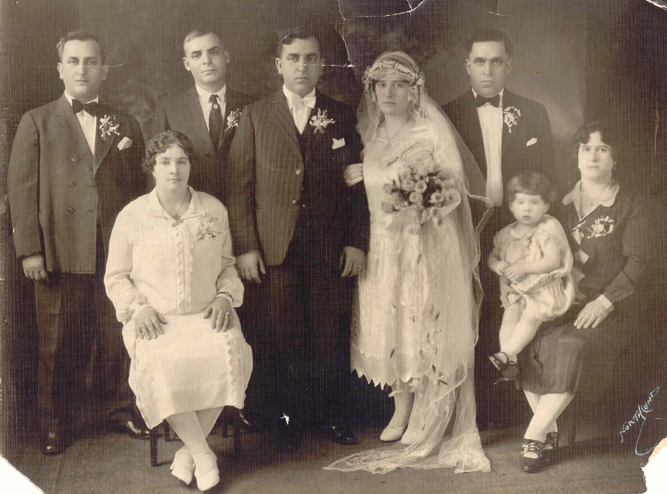 Wedding of Nicholas & Helen Sfakianos Hatzinikolis (center) George Hatinikolis, Zaharo Andros, Nicholas Andros,George Sfakianos & wife Paraskevi holding daughter Penny.jpg